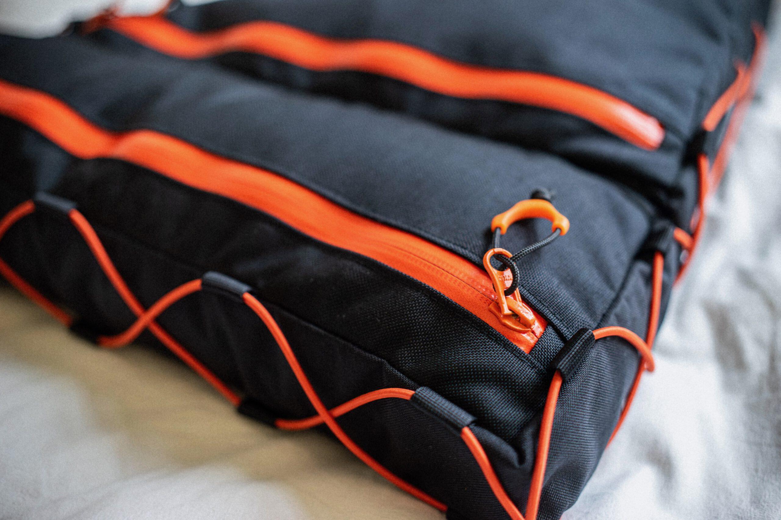 Rahmentasche fullframe 2-teilig von kirschpack, Nahaufnahme eines orangefarbenen Reißverschlusses mit Zipper